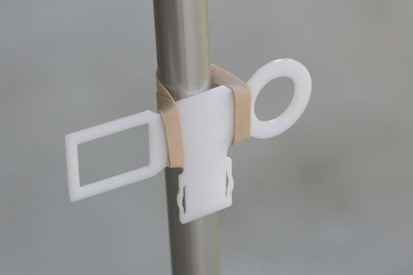 Trigger Tether attached to light stand with rubber band